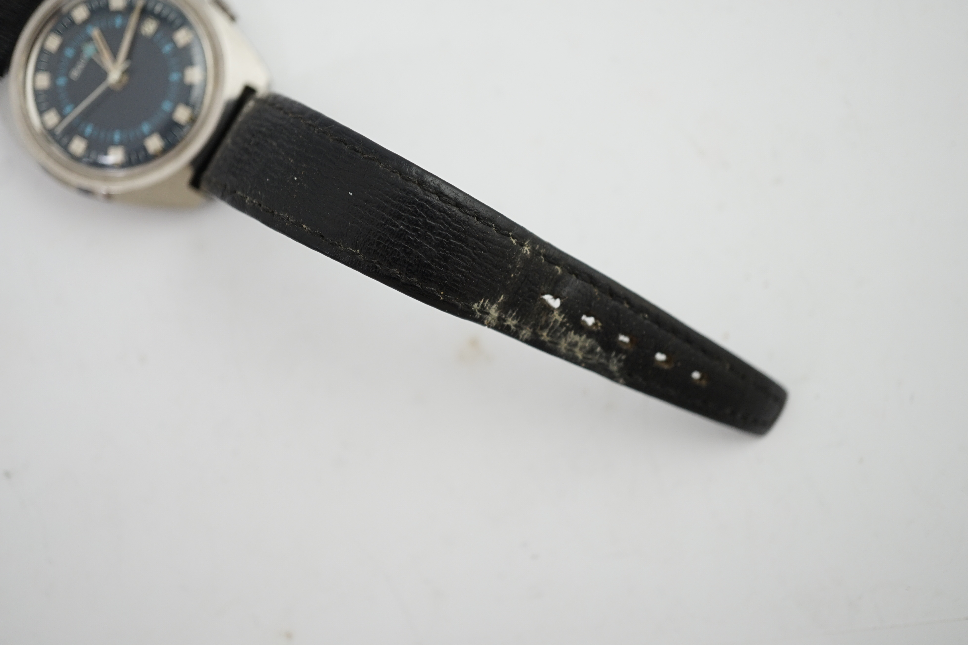 A gentleman's early 1970's stainless steel Bulova alarm manual wind wrist watch